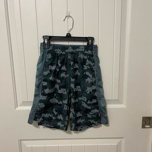 Different shades of green Nike basketball shorts